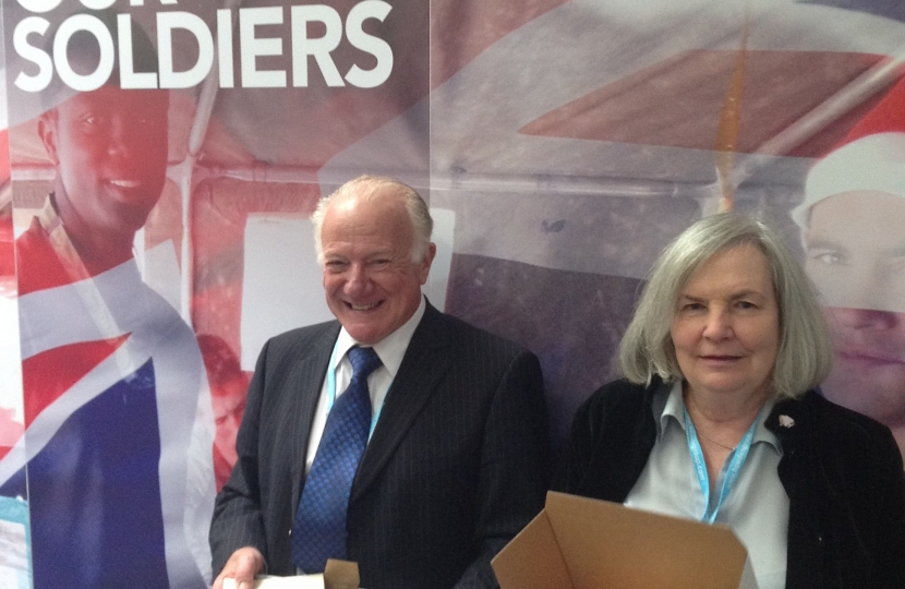 Cllr Bob Beauchamp and Maragret with a box ready to be sealed