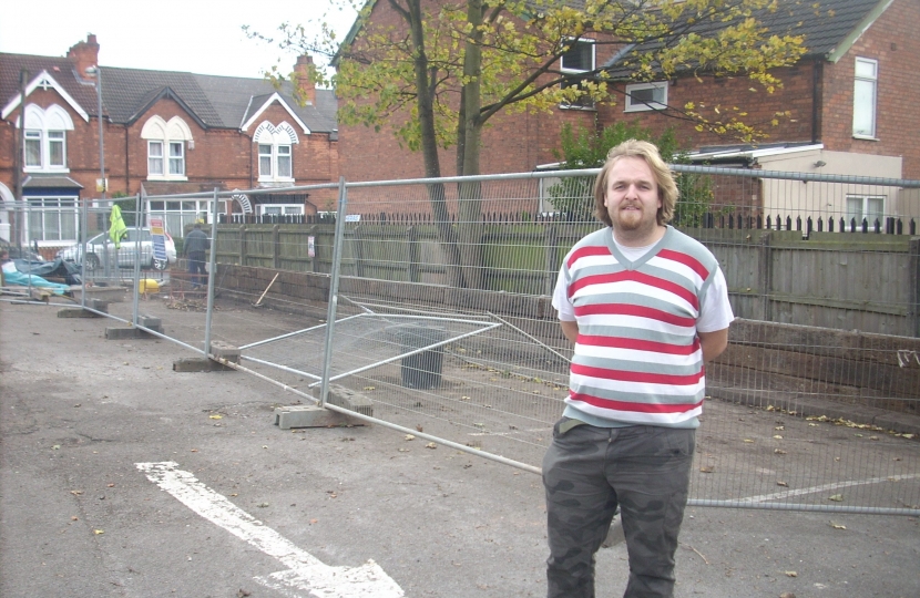 Robert looking at the work being done at the back with the new planters