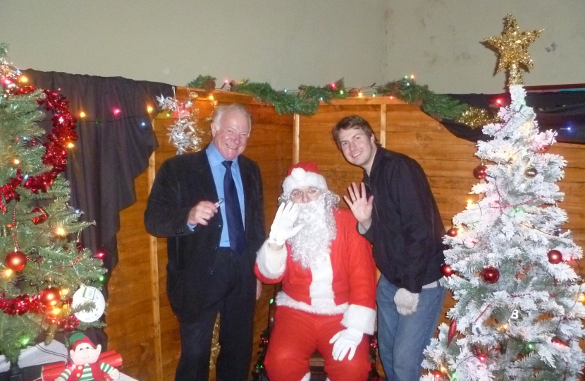Cllr Bob Beauchamp, Santa and Cllr Gareth Moore at St Margarets Church