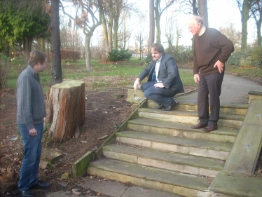 Gareth, Robert and Bob inspecting the old steps, which need to be repaired 