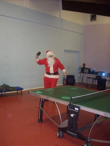 Santa playing in the table tennis tournament