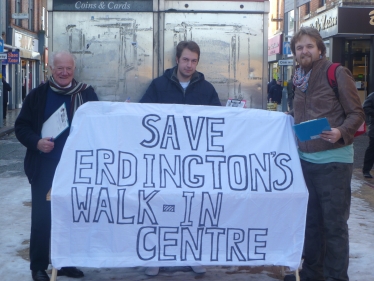 Bob, Gareth and Robert with their banner to save the centre